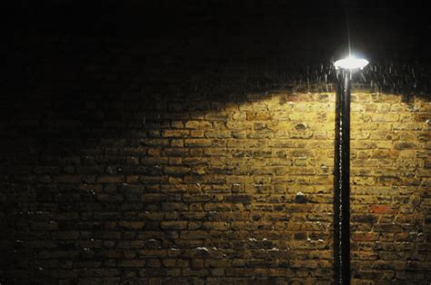 Illuminated Street Lamp By Brick Wall At Night Explore Doo Flickr