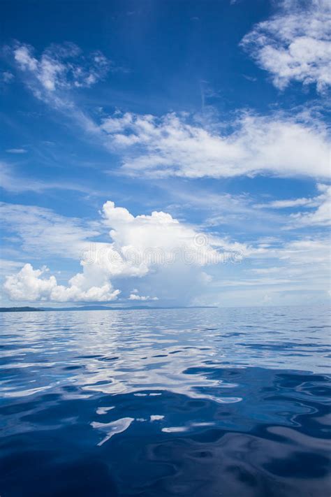 Photo Of Blue Sea And Tropical Sky Clouds Seascape Sun Over Water