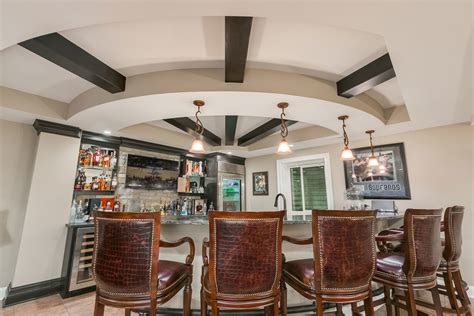 Steel rebar is generally used to reinforce the strength of these walls. Basement bar ceiling beams - Transitional - Basement ...