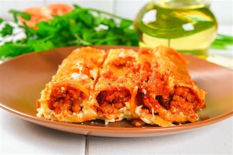 Traditional Italian Pasta Cannelloni Baked Tubes Stuffed With Minced Meat With Parmesan Cheese