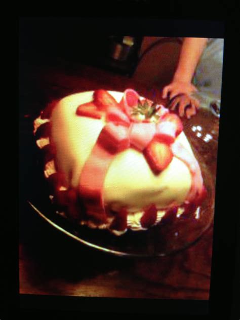 My mother in law gave me this recipe. Red velvet Cake 2 layers Whipped cream middle Fondant covering, Strawberries And whipped cream ...