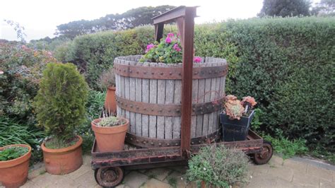 I Love This Wine Barrel Garden Idea In Front Of The Cellar Doors Sunset