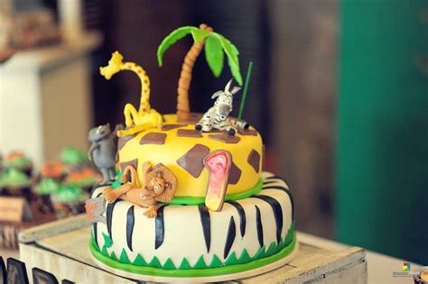 I especially love the cute penguin cupcake toppers and the awesome madagascar cake with the characters bursting out of crates. Kara's Party Ideas Madagascar Jungle Safari Birthday Party ...