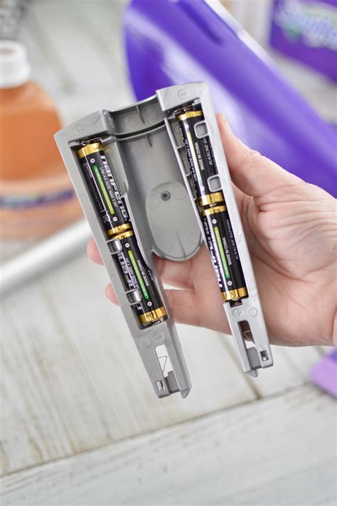Can anyone tell me how to change the batteries on the old style swiffer wetjet? Almost Effortless Wood Floor Cleaning with The Swiffer ...