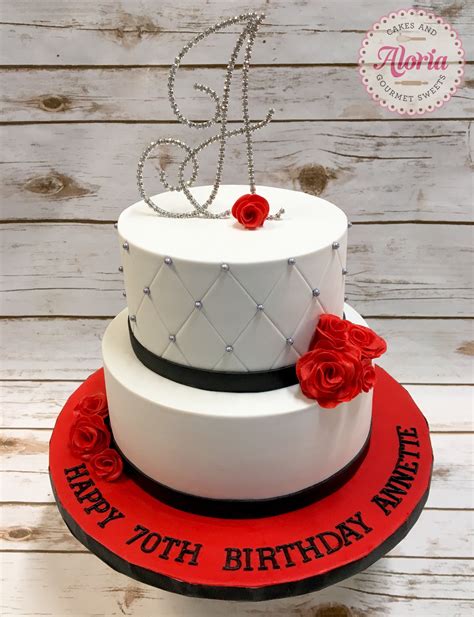 It could be we love you mum or a simple happy 70th birthday. 70th birthday cake, gum paste red roses, sugar flowers ...