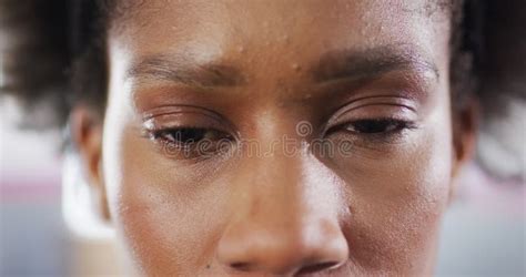 Close Up Video Portrait Of Blinking Eyes Of Happy African American