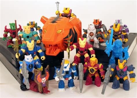 A Setup Display Of Several Battle Beasts Toys With The Battling