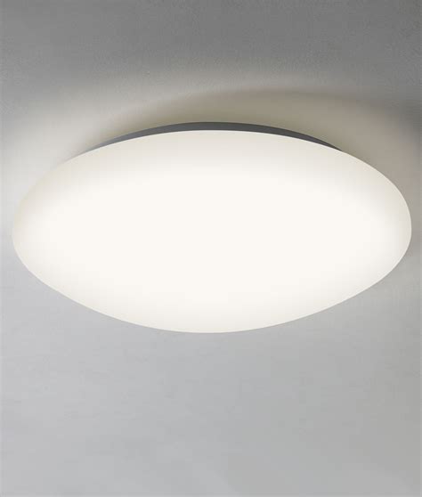 Decorate and revive the fluorescent lighting in your home or business. Flush Round Opal Ceiling Light IP44 Rated