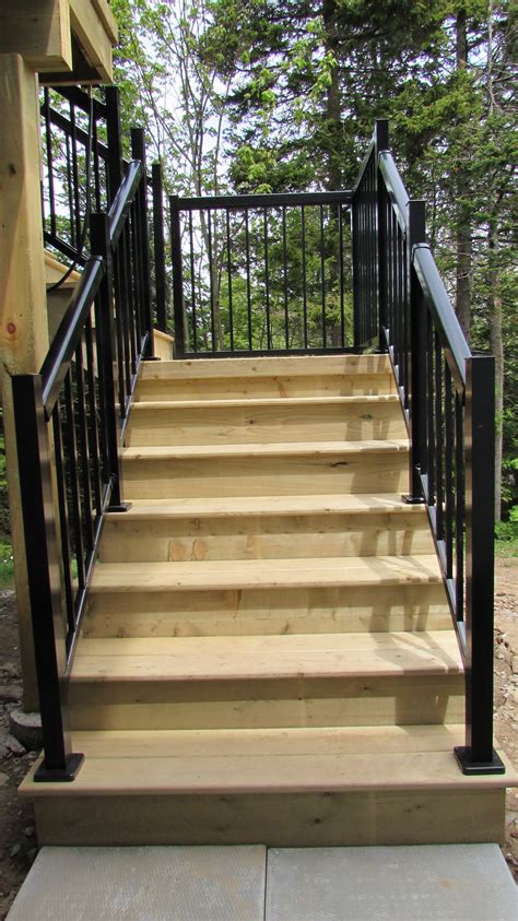 Pressure Treated Deck With A Regal Railing System