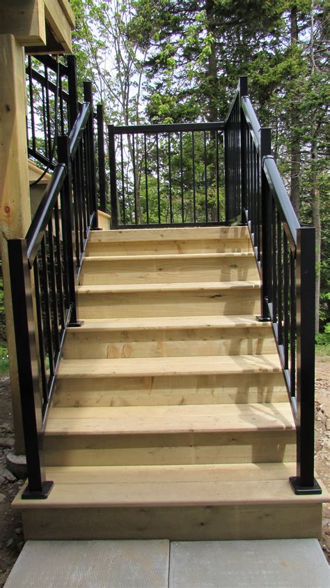 Our commercial railing systems and commercial stair railing can capably act as safety barriers for industrial railing for homes is becoming even more popular than a wire railing as a home bar or a. Pressure Treated Deck with a Regal Railing System