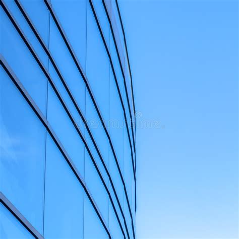 Reflective Glass Windows Of Building Against Sky Stock Photo Image Of