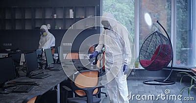 Men In Hazmat Suits Disinfecting Office Stock Video Video Of Cleaning