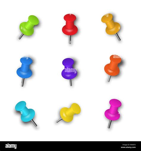 Multi Colored Pins With A Realistic Shadow On A White Background