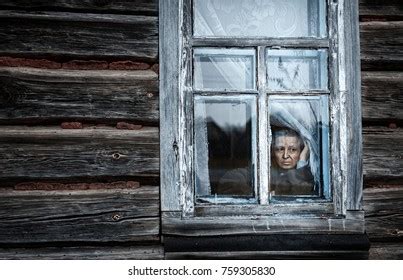 Sad Woman Looking Through The Window Over 4 096 Royalty Free