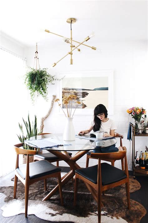 Here are a few of our dining rooms to give you some ideas on how your dining room could look: Cowhide Rug Under Round Dining Table - Beautiful shapes in ...