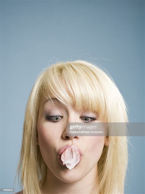 Woman Blowing Bubbles With Chewing Gum Photo Getty Images