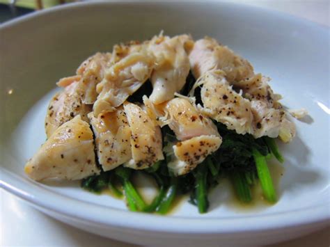 Add the chicken stock to the pan and cover the pan with a lid. PapaCheong's 拿手好菜: Pan Fry Chicken on bed of Spinach