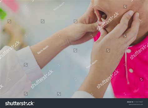 Doctor Checking Oral Cavity Student School Stock Photo 1110177407