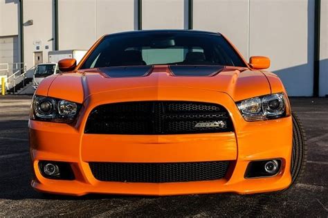 Is the 2014 dodge charger a family sedan or hot rod? Driven: 2014 Dodge Charger SRT8 Super Bee - Speed:Sport:Life