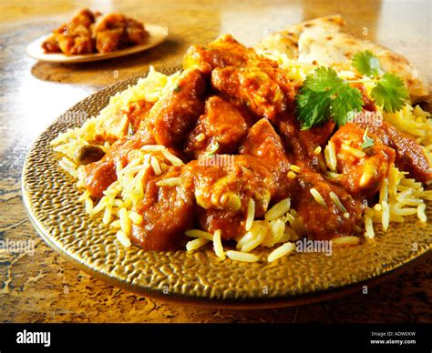 Indian Meal Chicken Madras Curry With Pilau Stock Photo Alamy
