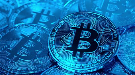 Learn about btc value, bitcoin cryptocurrency, crypto trading, and more. Cryptocurrency Bitcoin, BTC, Bit coins rotates in blue light. Blockchain technology, bitcoin ...