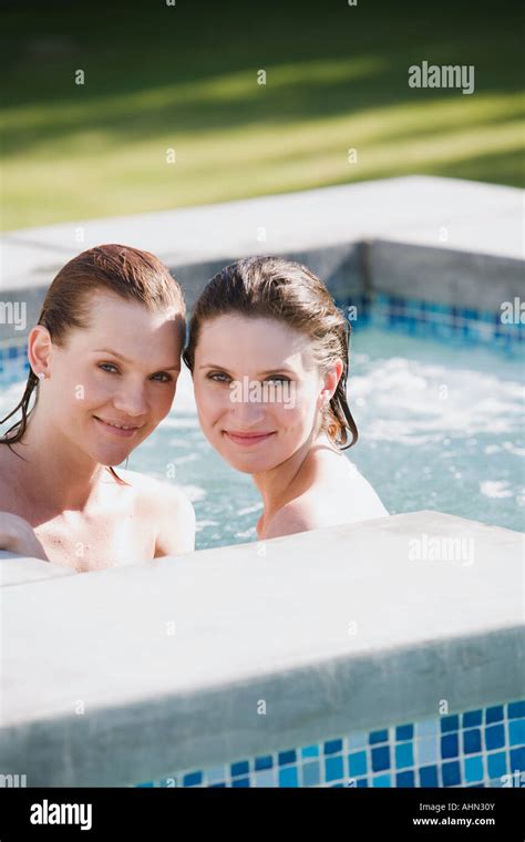 Lesbian Couple Relaxing In Hot Tub Stock Photo Alamy