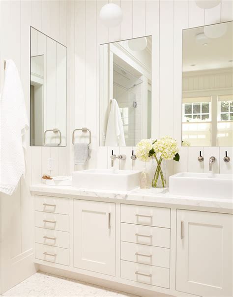 Contemporary brown natural tones family bathroom. Master bathroom, white vanity with two sinks and large ...