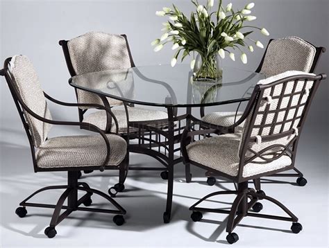 Versatile caster chair for your kitchen. Clear Glass Top Modern Dinette Table w/Optional Swivel Chairs