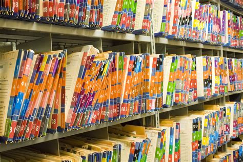 Rows Of Colorful Medical Records Patient Charts Global Document