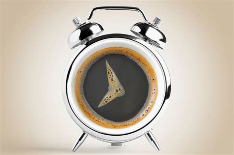 The smiling sun looks at you from a cup. The funny coffee clock - good morning