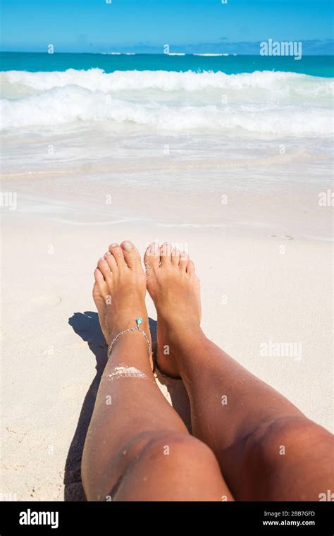 Beautiful Tan Legs Photographed On The Beach Stock Photo Alamy