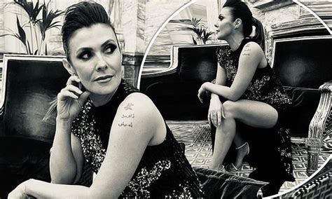 Kym Marsh Puts On A Very Leggy Display In A Shimmering Black Dress As