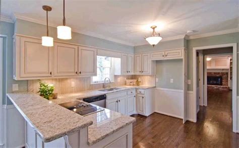For the nation kitchen wall colors with dark cabinets that struts it's butcherblock countertops and mason jar storage, gingham curtains are your best. dark floors with cream glazed cabinets and light granite | Kitchen Ideas | Pinterest | Cabinets ...