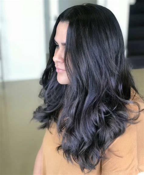 When choosing your hair color, it's best to consider your skin tone so your hair and skin complement each other. 23 Flattering Dark Hair Colors for Every Skin Tone