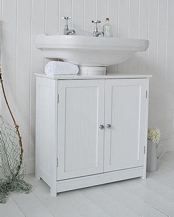 You can tidy up all stuff by having pedestal sink storage cabinet. Under sink bathroom Cabinet from The White Lighthouse ...