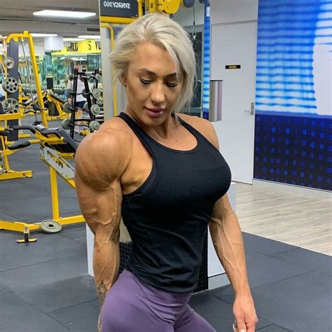 strong women fit women back and biceps lift and carry delts female athletes bodybuilders