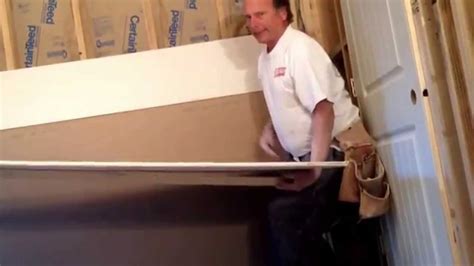 Lay your joint tape into the wet drywall compound and smoothly lay it into your freshly mudded joint. One person Installation of drywall ceilings - YouTube