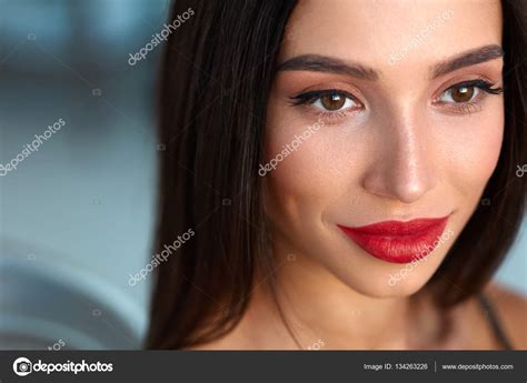 Woman With Beauty Face And Beautiful Makeup And Sexy Red Lips Stock