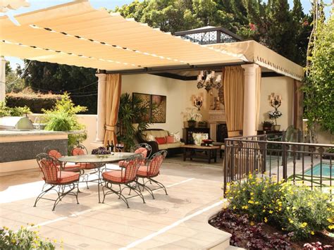 Outdoor Dining Area With Stylish Fabric Pergola And