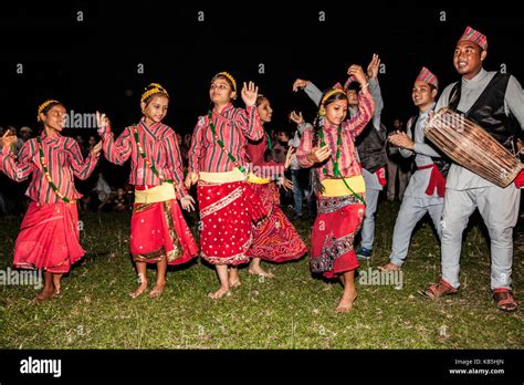 Nepali Girls Wearing Chaubandi Cholo Blouse And Fariya Skirt Dancing To The Tunes Of Nepali
