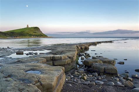 Kimmeridge Bay Where Rocks Jutted Up From The Beach Surrounded By