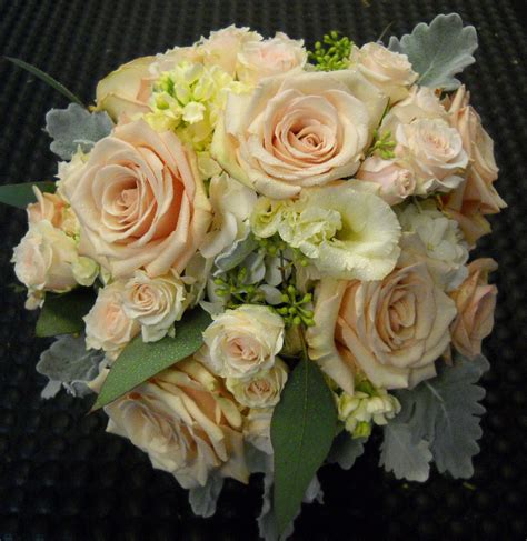 Lambs ear flower is known for its velvety green leaves that are often used as filler flowers in floral arrangements. Elegant Bridal Bouquet in muted pallet w/ Quicksand Roses ...