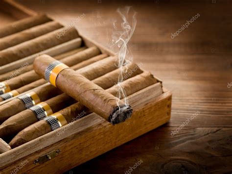 Smoking Cuban Cigar Over Box On Wood Background Stock Photo By