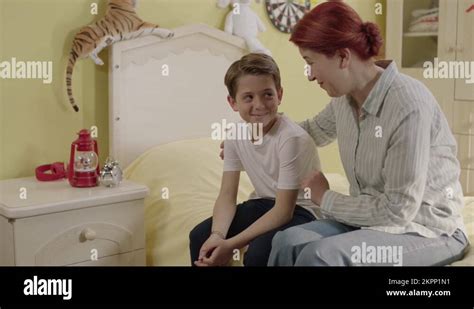 Mother Comforts Her Young Sonwho Has Problems In School And Social Life Stock Video Footage Alamy