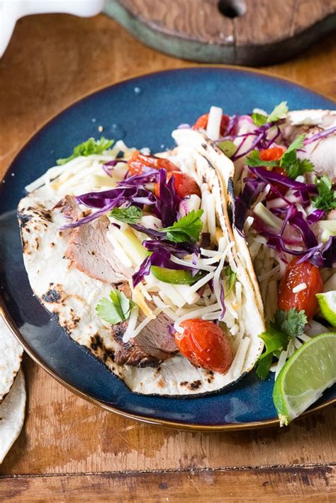 Pat the pork loin dry with a paper towel. Grilled Pork Street Tacos with Pickled Broccoli Stem Slaw and Blistered Tomatoes