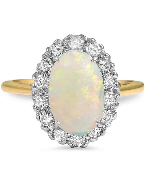 Check out our opal engagement ring selection for the very best in unique or custom, handmade pieces from our engagement rings shops. Opal Engagement Rings That Are Oh-So Dreamy | Martha ...