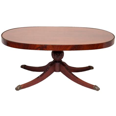 Duncan phyfe oval coffee table, description: Duncan Phyfe Mahogany Oval Coffee Table C. 1930-1940s ...