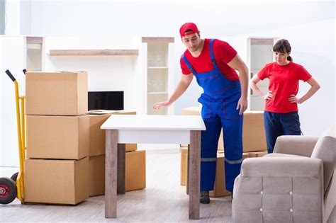 Premium Photo Professional Movers Doing Home Relocation