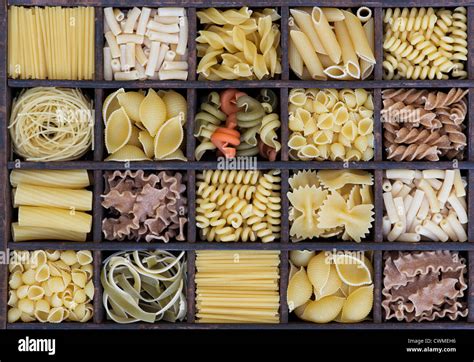 Different Types Of Dried Pasta In A Wooden Tray Stock Photo 50237634