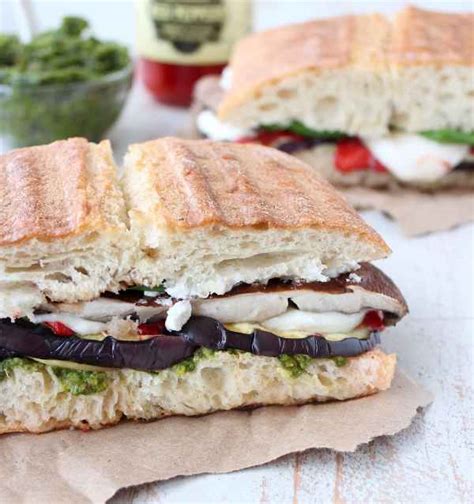 Using an additional small or medium pan, press down on sandwich and cook 3 minutes, or until browned. Grilled Vegetable Italian Panini Recipe - WhitneyBond.com